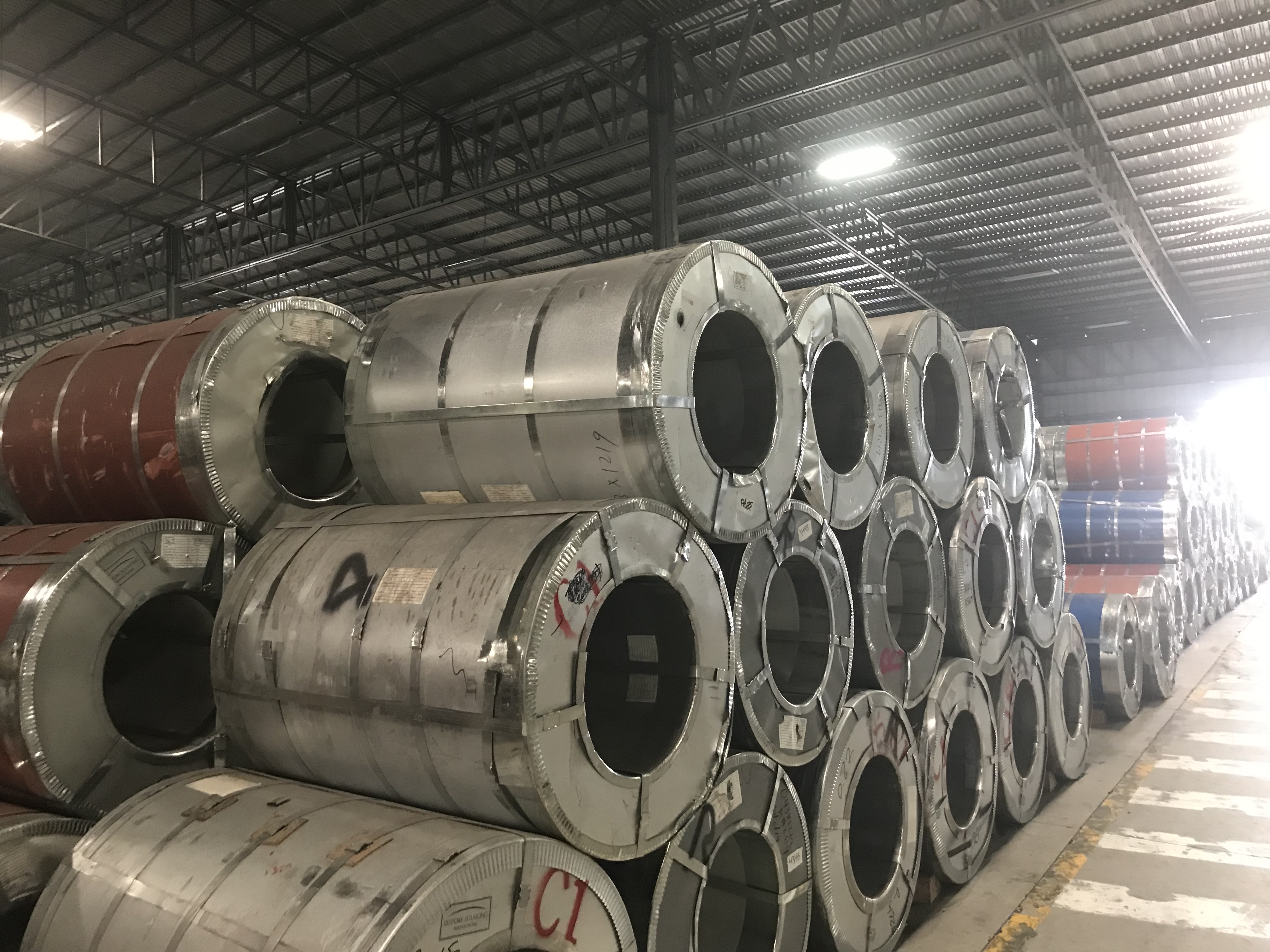 Steel coils in industrial warehouse